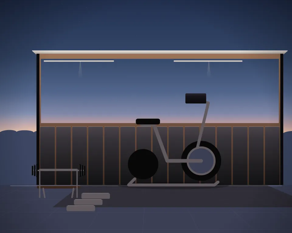 Illustration: a stationary training bicycle, with bench in a second practice bay in a generic dojo room, a central feature and foreground equipment, at late blue hour. Generic artwork, not a depiction of a listed venue.